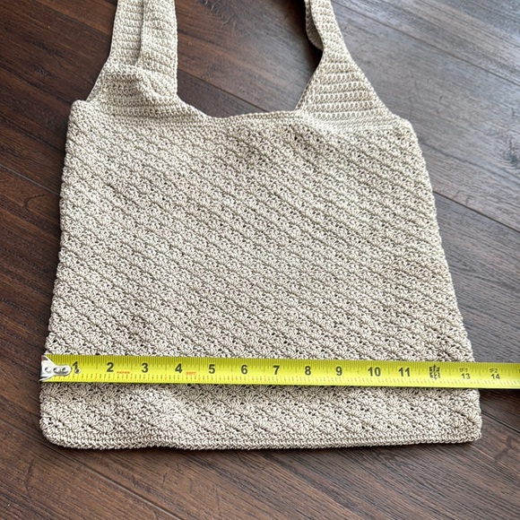 Elegant Cream Knit Tote Bag has pen marks on the inside otherwise great bag. - Picture 2 of 6